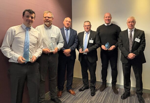 Minister for Housing, Paul McLennan MSP, with award winners.