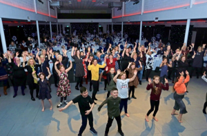 Children and Nurses dancing at the FNP Celebration event