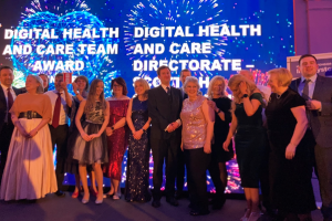 Digital Health and Care Team holding their award