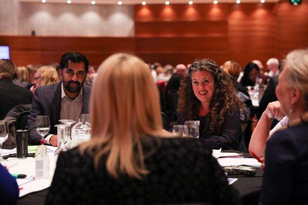Humza Yousaf, Cabinet Secretary for Health and Social Care, listens to discussion at the National Care Service Forum