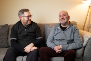 Richard and Martin sitting on a couch