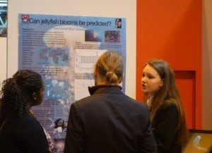 Skye explaining her project to some of the judges