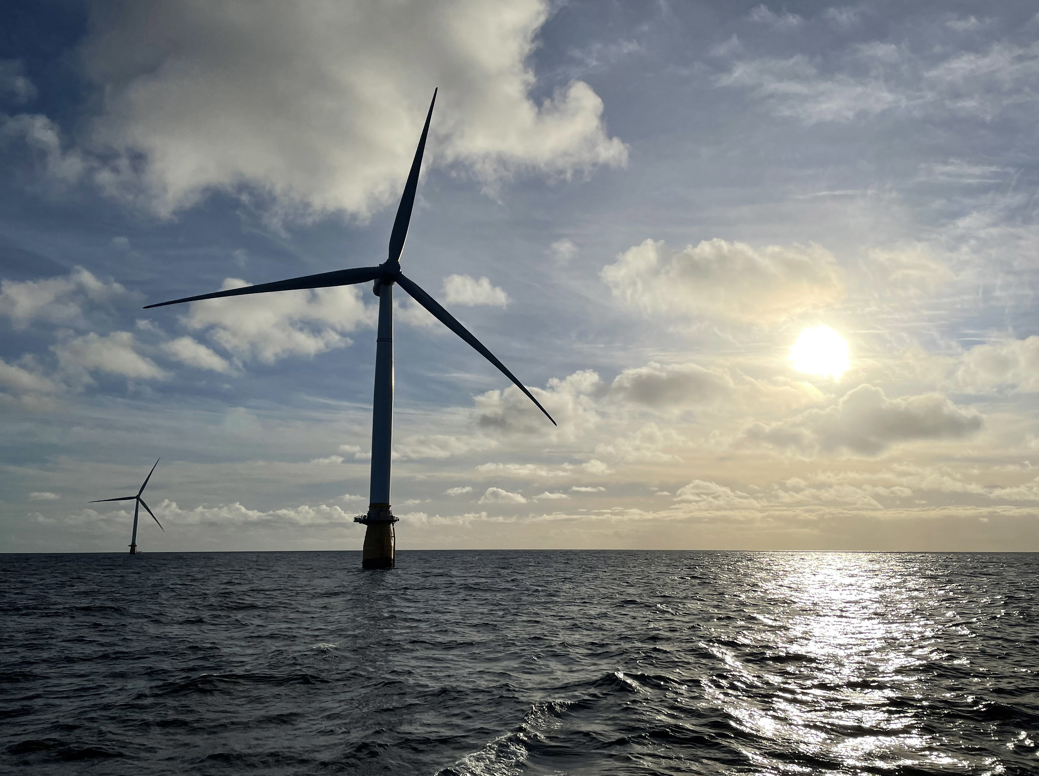 Floating offshore wind turbines in the early morning light