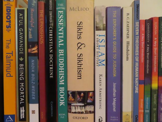 selection of faith & belief books on a shelf